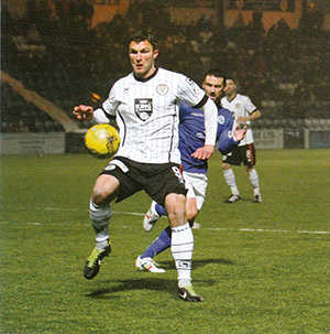 John Sutton sheilds the ball