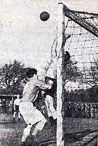 Sammy Wilson challenges George Tidy for the ball