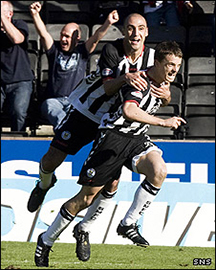 Stephen McGinn celebrates his goal